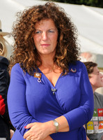 Sara Bathurst wearing a blue dress