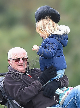 mischievous Mia Tindall plays with elderly family friend