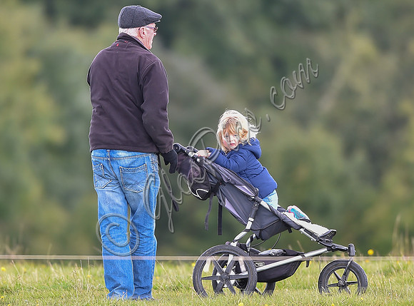 mischievous Mia Tindall plays with elderly family friend