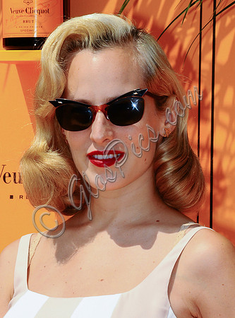 Charlotte Dellal, head shot with sunglasses
