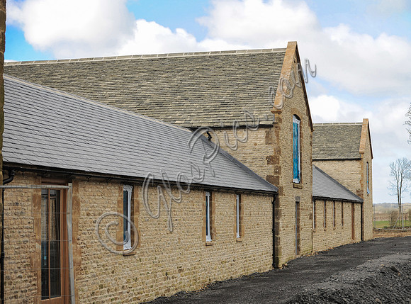 Beckham's new Cotswold property showing the different roof tiles joining the old and new buildings together