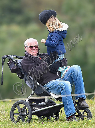 mischievous Mia Tindall plays with elderly family friend