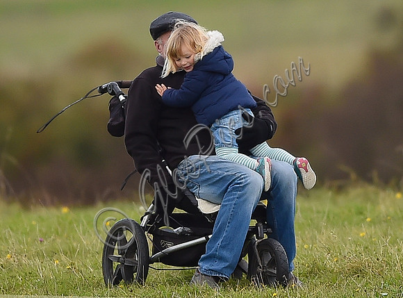 mischievous Mia Tindall plays with elderly family friend