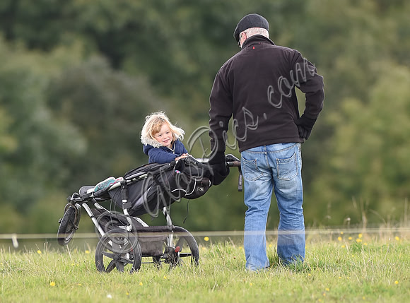 mischievous Mia Tindall plays with elderly family friend