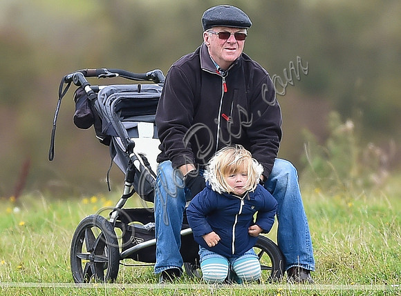 mischievous Mia Tindall plays with elderly family friend