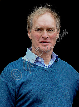 James Hervey-Bathurst in blue sweater