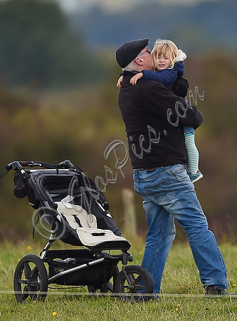 mischievous Mia Tindall plays with elderly family friend